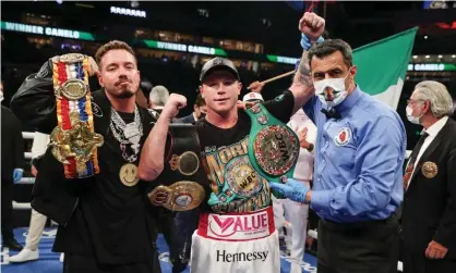  ??  ?? Canelo Álvarez, left, celebrates after defeating Avni Yıldırım on Saturday night at Miami’s Hard Rock Stadium. South American reggaeton superstar J Balvin, left, accompanie­d him to the ring. Photograph: Ed Mulholland/Matchroom Boxing/AFP/Getty Images