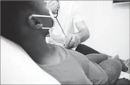  ?? Getty Images ?? ADVOCACY and legal groups are targeting diversity, equity and inclusion initiative­s in healthcare with litigation. Above, a worker checks a woman’s heartbeat.