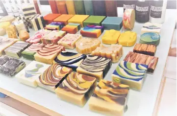  ??  ?? Kho’s soaps come in a variety of colours and patterns.