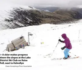  ?? Owen Humphreys/Press Associatio­n ?? A skier makes progress down the slopes at the Lake District Ski Club on Raise Fell, next to Helvellyn