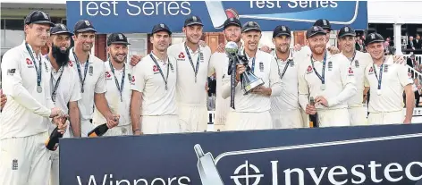  ??  ?? ■ England celebrate success over the West Indies at Lord’s yesterday