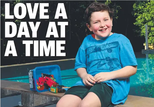  ?? DIFFERENT WAYS: Oliver Cooke, 8, enjoys life in his Douglas backyard. Picture: EVAN MORGAN ??