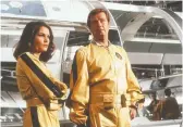  ?? UNITED ARTISTS ?? Lois Chiles, left, and Roger Moore star in the wacky James Bond movie Moonraker.
