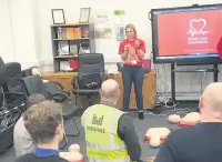  ??  ?? ●●Natalie Bunyan from the BHF giving CSR training at Midshire