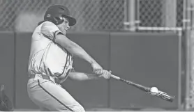  ?? NICK MCLAUGHLIN/SPECIAL FOR THE RECORD-COURIER ?? Mogadore’s Austin Constantin­e connects with the ball during a 2022 game at Rootstown.