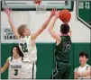  ?? RANDY MEYERS — FOR THE MORNING JOURNAL ?? Columbia’s Cody Davis contests the shot by Smithville’s Carter Piatt during the second quarter on Feb 26.