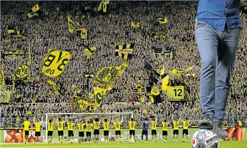  ?? Pictures: Getty Images ?? The fans of Borussia Dortmund celebratin­g the win during the Bundesliga match between Borussia Dortmund and Bayer 04 Leverkusen at the Signal Iduna Park in Dortmund, Germany.