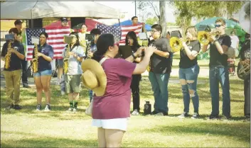  ?? ?? Marching bands from Kofa High School, Cibola High School, and Yuma High School play the national anthem.