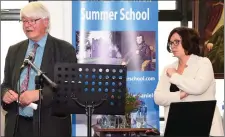  ??  ?? Dr Martin Mansergh taking questions under the watchful eye of Kerry County Council CEO Moira Murrell and the portrait of Daniel O’Connell at the Daniel O’Connell Summer School in the library, Cahersivee­n, on Friday