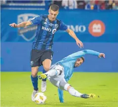  ?? PETER MCCABE/ASSOCIATED PRESS ?? New York City FC’s David Villa, right, battles Montreal’s Alejandro Silva for the ball in their game Saturday.