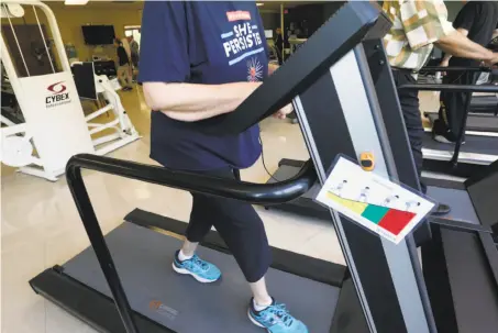  ?? Jim Mone / Associated Press ?? Rita Driscoll uses a treadmill as part of a supervised exercise therapy program at the University of Minnesota Medical Center.