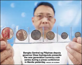  ?? MIGUEL DE GUZMAN ?? Bangko Sentral ng Pilipinas deputy governor Diwa Guinigundo presents the new generation currency coin series during a press conference in Manila yesterday.