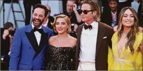  ?? Kate Green / TNS ?? From left, Nick Kroll, Florence Pugh, Chris Pine and Olivia Wilde attend the “Don't Worry Darling” red carpet at the 79th Venice Internatio­nal Film Festival on Sept. 5 in Venice, Italy.