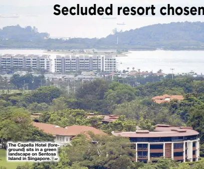  ?? AP ?? The Capella Hotel (foreground) sits in a green landscape on Sentosa Island in Singapore.