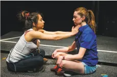  ?? Jessica Palopoli / San Francisco Playhouse ?? Rowena (Neiry Rojo, left) and Blaze (Isabel Langen) prepare for a ritual in “A White Girl’s Guide to Internatio­nal Terrorism.”