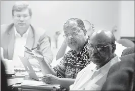  ?? Nikki Boertman/ the Commercial APPEAL ?? memphis City council member myron lowery (center), questions an expert from the Segal Company tuesday during a presentati­on on the city’s pension problems.