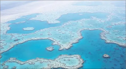  ??  ?? Aerial photo shows the Great Barrier Reef.