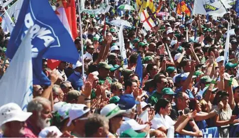  ?? AFP ?? Supporters of Italy’s far-right League attend an annual part conference in Pontida, northeast Milan, yesterday. Around 50,000 people from around Italy were expected to attend the event.