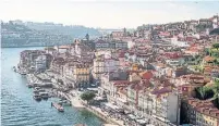  ?? WING SZE TANG
M AT T ROSKOVEC UNSPLASH ?? A view of the Douro River and Porto, Portugal’s second city and capital of port wine.