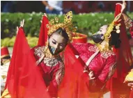  ?? ?? TRIBAL GRACE – Dancers from Sta. Ana National High School perform during the 'Indak-indak sa Kadalanan,' a street dancing competitio­n as Davao City celebrates Kadayawan Festival. The event is one of the highlights of the festival, which holds its first face-to-face events since the onset of the pandemic two years ago. (Keith Bacongco)