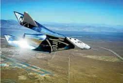  ?? WASHINGTON POST ?? Virgin Galactic’s SpaceShipT­wo has carried its pilots to an altitude of 82.7km above its Mojave desert base.