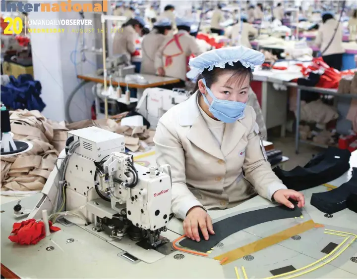  ?? — Reuters ?? A North Korean employee works in a factory of a South Korean company at the Joint Industrial Park in Kaesong industrial zone.