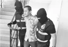  ??  ?? Mohd Firdaus is charged with six counts of committing terrorism activities.