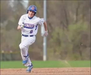  ??  ?? Danbury’s Jackson Ciccone rounds second on his way home to score against St. Joseph in 2019.