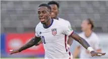  ?? AP PHOTO/FERNANDO LLANO ?? The United States’ Tim Weah celebrates scoring his side’s opening goal against Jamaica during a qualifying soccer match for the FIFA World Cup Qatar 2022 in Kingston, Jamaica, on Tuesday.