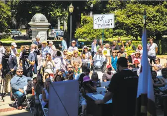  ?? Robbie Short / CALmatters ?? Opponents of a bill that would sharply limit “conversion therapy” for gays rally outside the Capitol in June. The measure would outlaw the advertisin­g and sale of such approaches.