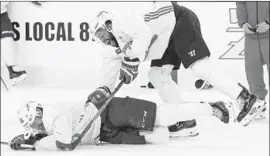  ?? Ross D. Franklin Associated Press ?? LIFE IS GOOD when you’re up 3-1 in the Stanley Cup Final, as Washington’s Devante Smith-Pelly, right, and Jay Beagle share a light moment during practice.