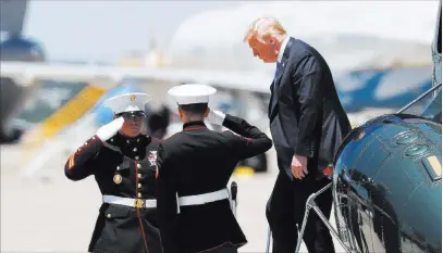  ?? Pablo Martinez Monsivais ?? The Associated Press President Donald Trump arrives Wednesday at Andrews Air Force Base to pay respects to the family of U.S. Secret Service Special Agent Nole E. Remagen, who died after suffering a stroke while on duty during Trump’s recent overseas trip to Scotland.