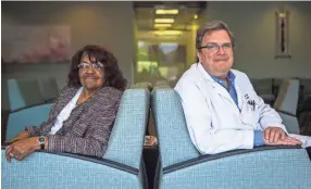  ?? APPEAL ?? Barbara Dowell, 74, of Memphis, poses for a portrait with her physician Dr. James Litzow, a cardiologi­st at Sutherland Cardiology Clinic in Germantown. In February, Dowell had a new AFib device implanted in her heart to avoid using blood-thinner...