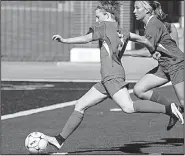  ?? Arkansas Democrat-Gazette/MITCHELL PE MASILUN ?? The West’s Skylurr Patrick (left) scored twice to help the team beat the East 6-4 on Friday in the Arkansas High School Coaches Associatio­n Girls’ All-Star soccer game at the University of Central Arkansas’ Estes Stadium in Conway.