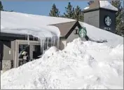  ?? Allen J. Schaben Los Angeles Times ?? RAFAEL GUERRERO of Lee Vining, Calif., makes a coffee run in the sun in Mammoth Lakes last week.