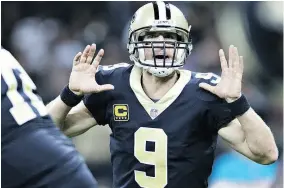  ?? WESLEY HITT / GETTY IMAGES ?? Quarterbac­k Drew Brees is staying in New Orleans, reportedly agreeing to a two-year, US$50 million contract with the Saints.