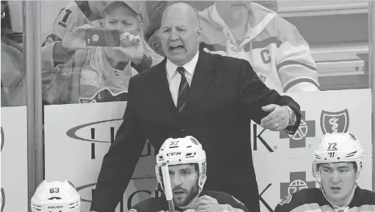  ?? AP FILES ?? Claude Julien behind the bench in one of his last games as coach of the Bruins. Julien, Pat Burns and Alain Vigneault all graduated from the Hull Olympiques to coach in the NHL.