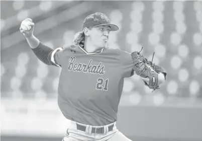  ??  ?? Klein Collins’ Nick Mikolajcha­k picked up three saves, allowing Sam Houston State to celebrate its historic win in Lubbock and trip to the super regionals. Top: Juan DeLeon Left: Lubbock Avalanche-Journal