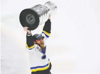  ?? GETTY IMAGES FILES ?? It may be a long time before we see the Stanley Cup raised again — here by Ryan O’reilly of the St. Louis Blues last June.