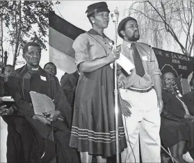  ?? Photo: Eli Weinberg/Robben Island Mayibuye Archives ?? Leader: Lilian Ngoyi gives an address in front of the ANC and Fedsaw Transvaal banners.