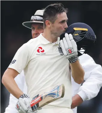  ?? Reuters ?? Chris Woakes celebrates after completing his maiden Test century for England as the home side took control of the match against India at Lord’s yesterday