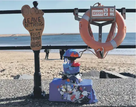  ?? ?? One of the students’ recycled waste art sculptures with an important message for visitors to the beach.