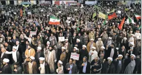  ?? AP/EBRAHIM NOROOZI ?? Iranians protest and chant slogans Saturday at a rally in Tehran.