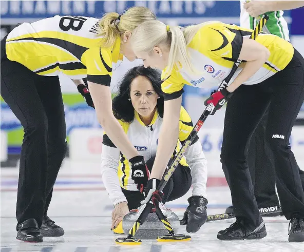  ?? — THE CANADIAN PRESS ?? Manitoba skip Michelle Englot delivers a shot during her rink’s 8-5 victory over Saskatchew­an Sunday morning at the Scotties Tournament of Hearts at Meridian Centre in St. Catharines, Ont. Englot, who is from Regina, is 3-0 so far at the national...