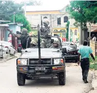  ?? FILE ?? The security forces on the ground during the early stages of the state of emergency in St James.