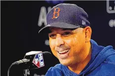  ?? ROBERT F. BUKATY/ASSOCIATED PRESS ?? The Boston Red Sox have picked up Alex Cora’s option for two more seasons, rewarding their manager for taking them to the ALCS in his first year back after serving his one-year sign-stealing suspension.