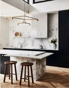  ??  ?? 1 Sphera glass pendant, $179, from Freedom. 2 AB pendant, $440, from Citta. 3 Mercer Aurora gooseneck mixer, $599, from
Kitchen Hub. 4 White marble serving board, $12, from Kmart. 5 Sylvan cabinet handle in brushed brass, $7.88, from Mitre 10.