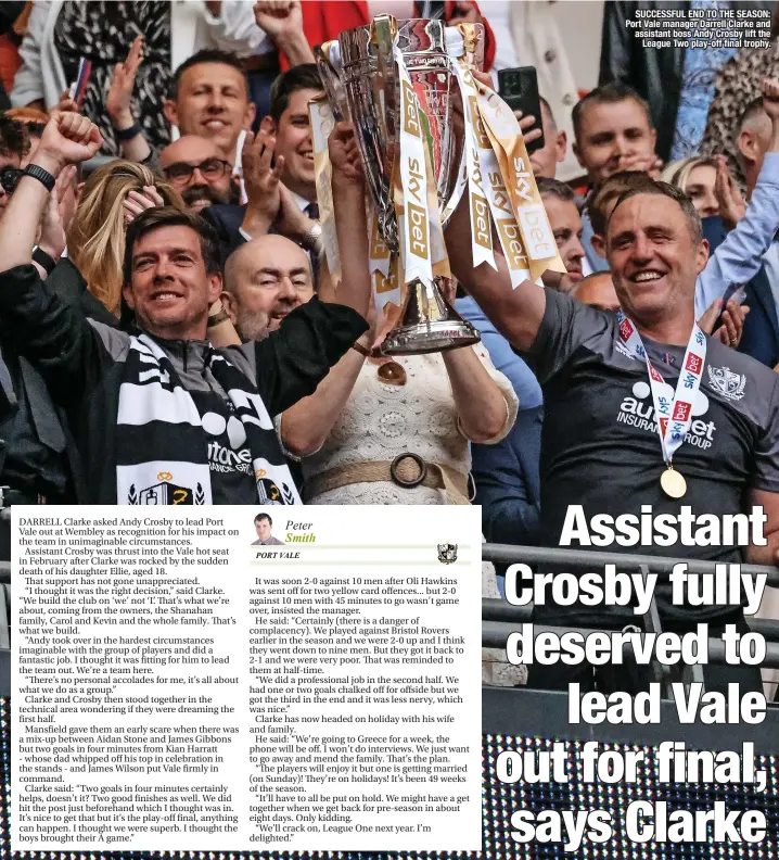  ?? ?? SUCCESSFUL END TO THE SEASON: Port Vale manager Darrell Clarke and assistant boss Andy Crosby lift the League Two play-off final trophy.