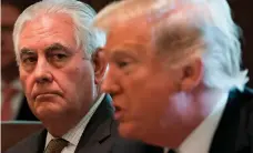  ?? AFP ?? Rex Tillerson, left, and president Donald Trump have made pronouncem­ents about policy that are not in tune