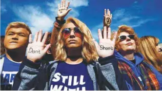  ??  ?? Attendees of the March for Our Lives event demanding gun control in Washington on Saturday.